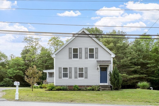 558 Amesbury Rd, Haverhill, MA 01830 - traditional-style home featuring a front yard and entry steps