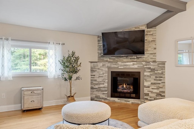558 Amesbury Rd, Haverhill, MA 01830 - living room with wood finished floors, lofted ceiling, and a fireplace