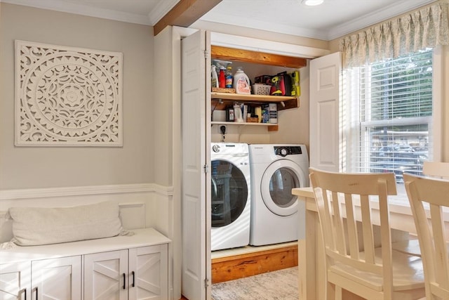558 Amesbury Rd, Haverhill, MA 01830 - washroom with washing machine and dryer, crown molding, and a wainscoted wall