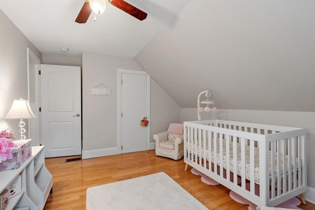 558 Amesbury Rd, Haverhill, MA 01830 - bedroom featuring light wood-style flooring, lofted ceiling, and a ceiling fan