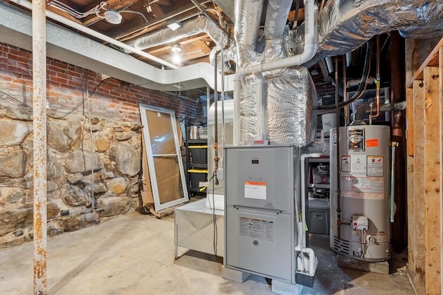 558 Amesbury Rd, Haverhill, MA 01830 - utility room with gas water heater and heating unit