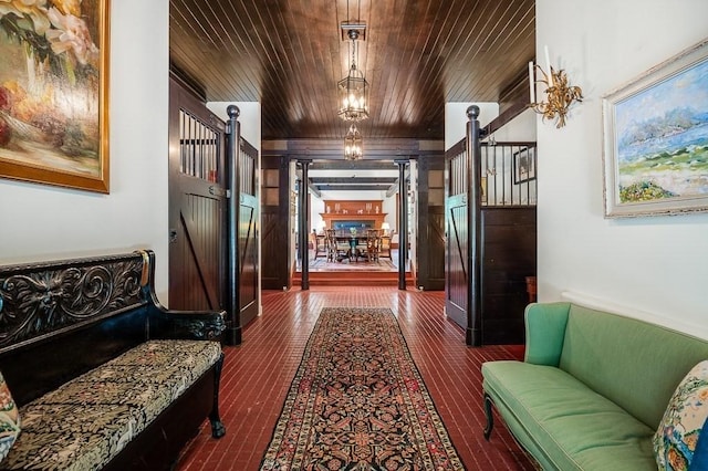 4 Dexter Ln, Manchester, MA 01944 - hallway featuring a barn door and wood ceiling