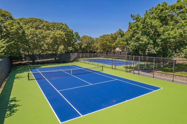 view of tennis court with basketball court