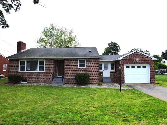 25 Williams St, Ludlow, MA 01056 - ranch-style house featuring an attached garage, asphalt driveway, brick siding, entry steps, and a front yard