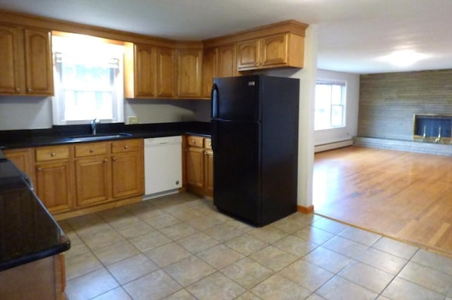 25 Williams St, Ludlow, MA 01056 - kitchen featuring freestanding refrigerator, dishwasher, a sink, a baseboard radiator, and open floor plan