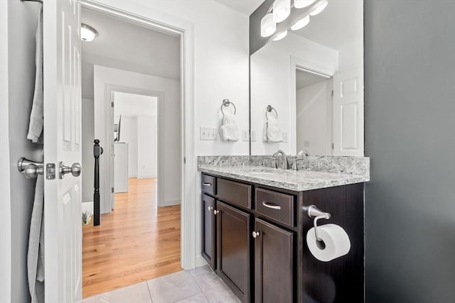 bathroom featuring tile patterned floors and vanity