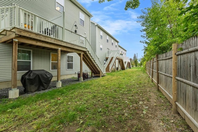 view of yard with a wooden deck