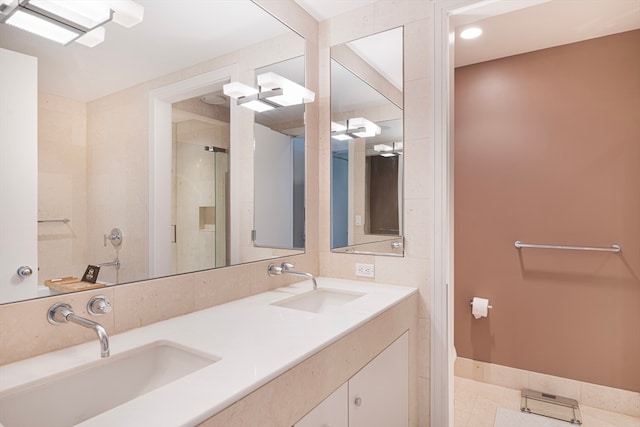 bathroom with tile patterned flooring and vanity