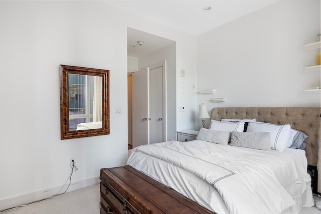 bedroom with light carpet