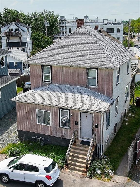 4 Atherton Rd, Hull, MA 02045 - view of front of home with central air condition unit and roof with shingles