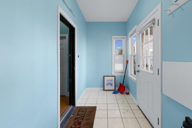 27 Cook St, Fall River, MA 02724 - doorway to outside with light tile patterned flooring and baseboards