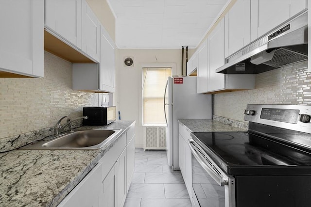 27 Cook St, Fall River, MA 02724 - kitchen featuring stainless steel electric stove, under cabinet range hood, black microwave, white cabinetry, and light marble finish floors