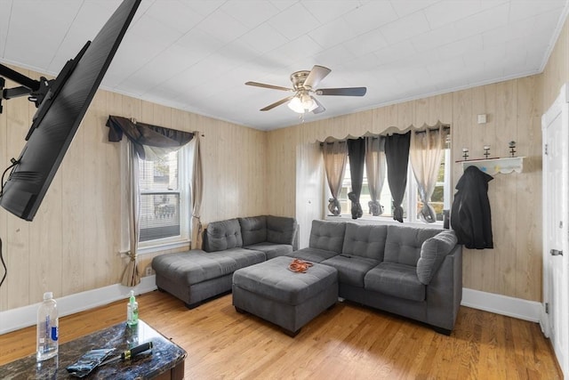 27 Cook St, Fall River, MA 02724 - living room featuring a ceiling fan, ornamental molding, wood walls, and wood finished floors
