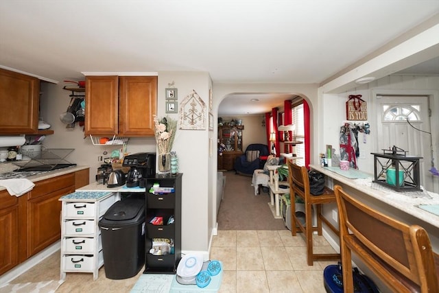 kitchen featuring light tile patterned flooring