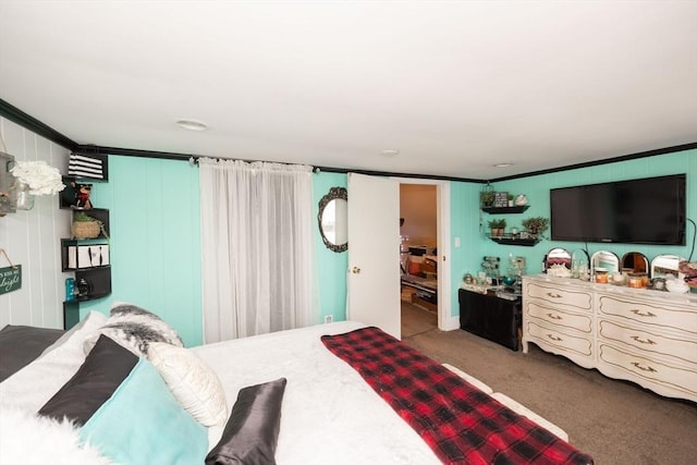 bedroom featuring carpet flooring and crown molding