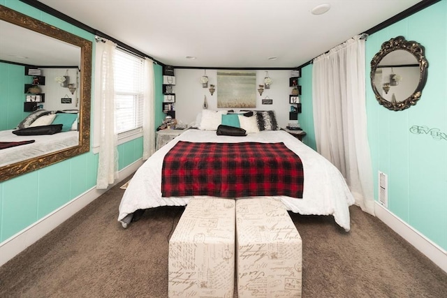 carpeted bedroom with ornamental molding