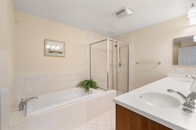 bathroom featuring tile patterned floors, vanity, and plus walk in shower