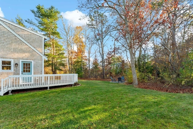 view of yard featuring a deck