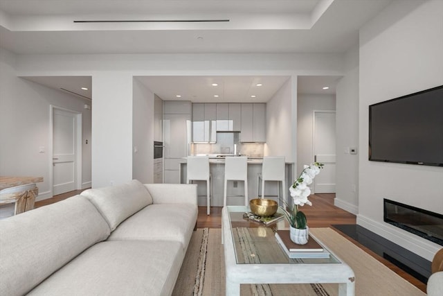 living room with hardwood / wood-style flooring