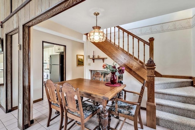 41 Kenwood Rd, Bourne, MA 02559 - dining area featuring light tile patterned floors and stairway