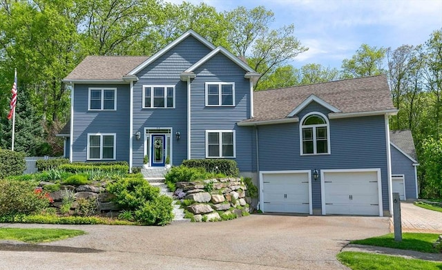 32 Erins Way, Holden, MA 01520 - view of front facade featuring an attached garage and driveway