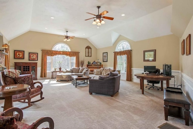 32 Erins Way, Holden, MA 01520 - living area with a desk, a wainscoted wall, plenty of natural light, light carpet, and lofted ceiling