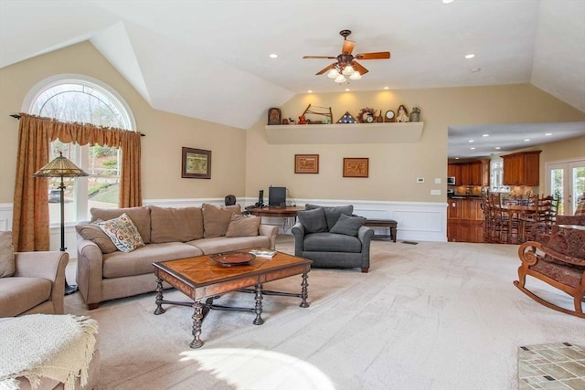 32 Erins Way, Holden, MA 01520 - living room featuring lofted ceiling, a wainscoted wall, ceiling fan, light carpet, and a decorative wall
