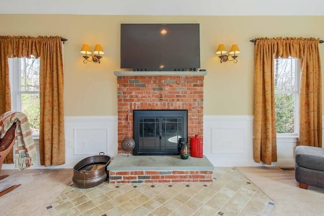 32 Erins Way, Holden, MA 01520 - living room with wainscoting, healthy amount of natural light, carpet, and a brick fireplace