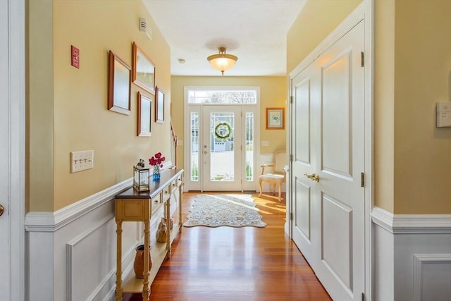 32 Erins Way, Holden, MA 01520 - foyer entrance featuring wainscoting, a decorative wall, and wood finished floors
