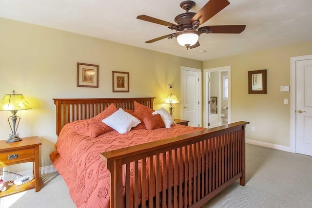 32 Erins Way, Holden, MA 01520 - bedroom with light colored carpet, baseboards, ensuite bath, and a ceiling fan