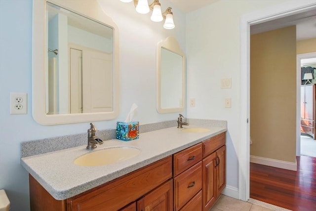 32 Erins Way, Holden, MA 01520 - bathroom with double vanity, baseboards, and tile patterned floors