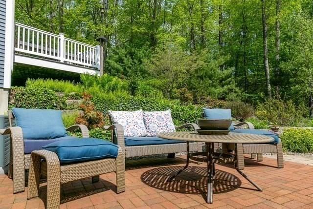 32 Erins Way, Holden, MA 01520 - view of patio featuring a wooded view