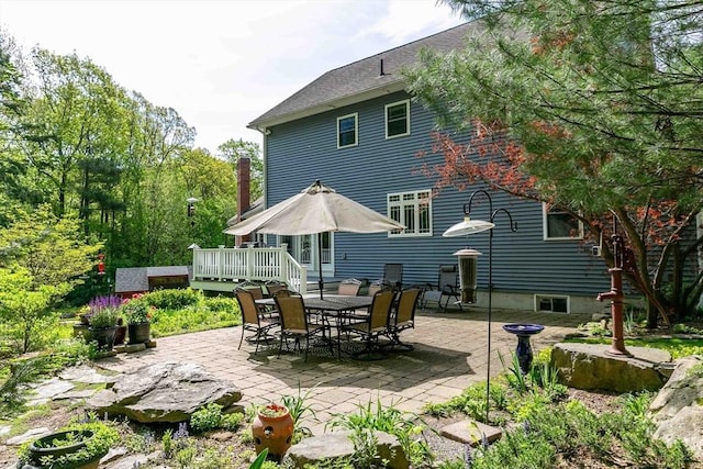 32 Erins Way, Holden, MA 01520 - back of house with a patio, a wooden deck, and outdoor dining space