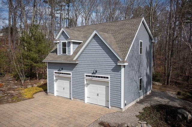 32 Erins Way, Holden, MA 01520 - view of property exterior with a shingled roof and a garage
