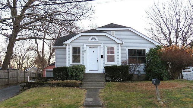 bungalow with a front lawn