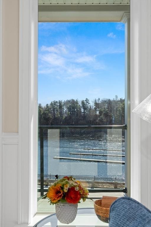 balcony featuring a water view