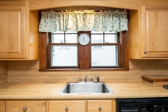 47 Ronald Rd, Arlington, MA 02474 - kitchen with a sink, light brown cabinetry, dishwasher, and light countertops