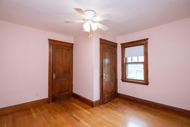 47 Ronald Rd, Arlington, MA 02474 - unfurnished room featuring baseboards, light wood-style flooring, and ceiling fan