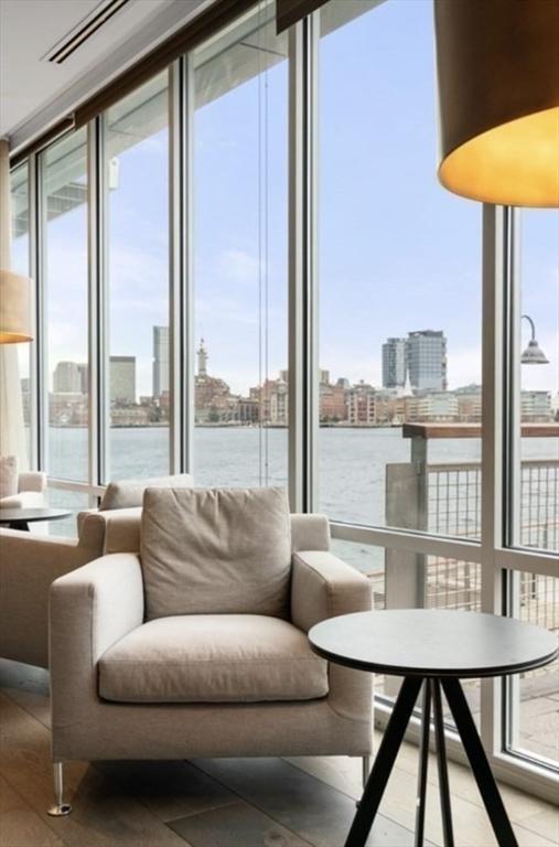 65 Lewis St Unit Ph03, Boston, MA 02128 - sunroom featuring a water view and a city view