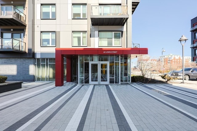 65 Lewis St Unit Ph03, Boston, MA 02128 - entrance to property featuring brick siding