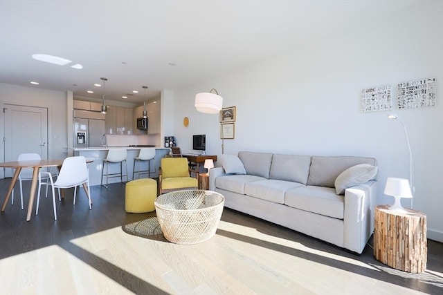 65 Lewis St Unit Ph03, Boston, MA 02128 - living room featuring recessed lighting and wood finished floors