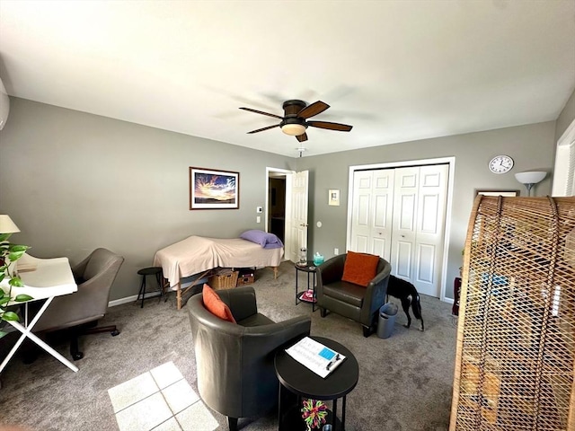 bedroom with ceiling fan, carpet floors, a closet, and baseboards