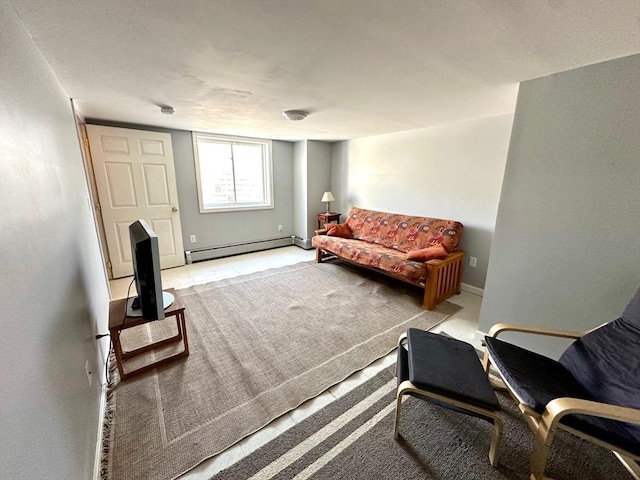 carpeted living room with a baseboard radiator and baseboards