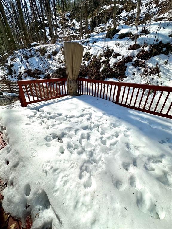 view of snow covered deck