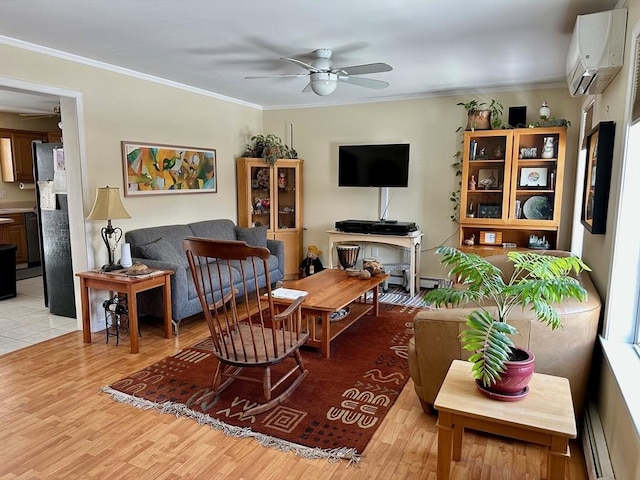 living room featuring crown molding, a baseboard radiator, a wall mounted AC, ceiling fan, and light wood-type flooring