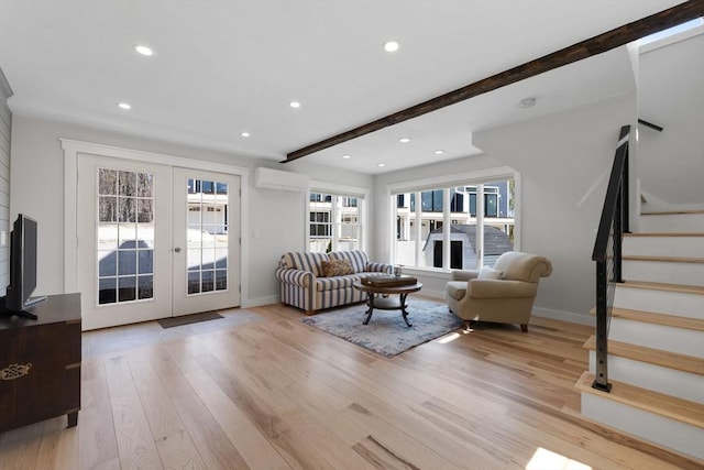 living area featuring stairs, recessed lighting, baseboards, and french doors
