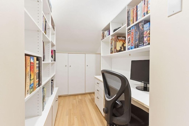 office with light wood-type flooring