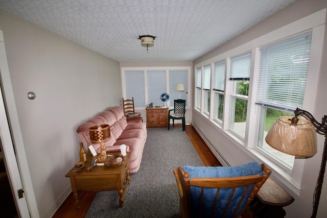 66-R Beach St, Warren, RI 02885 - sunroom with baseboard heating and wood finished floors