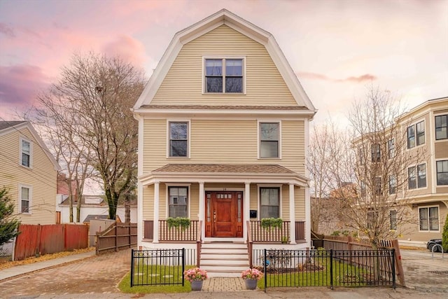 front facade featuring covered porch