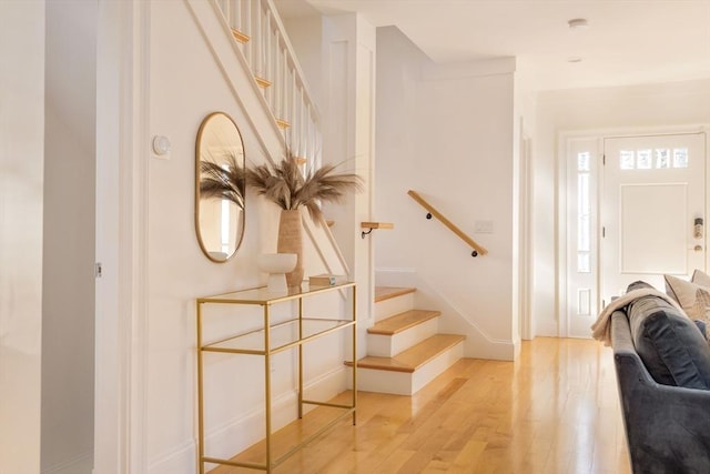 stairs with wood-type flooring